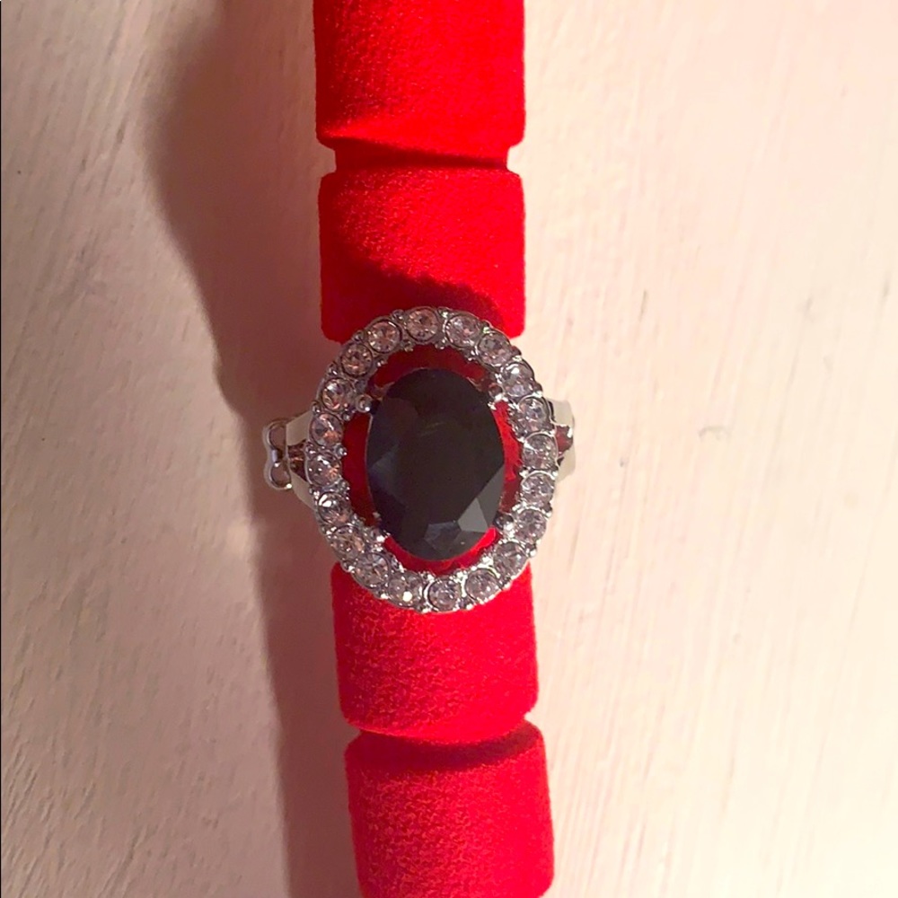 Diamond ring with black stone in the middle ✨